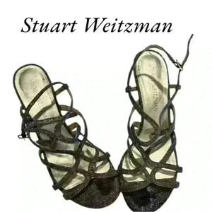 Stuart Weitzman Turning Up Heels size 7.5 Metallic strappy heels. Gently used.‎